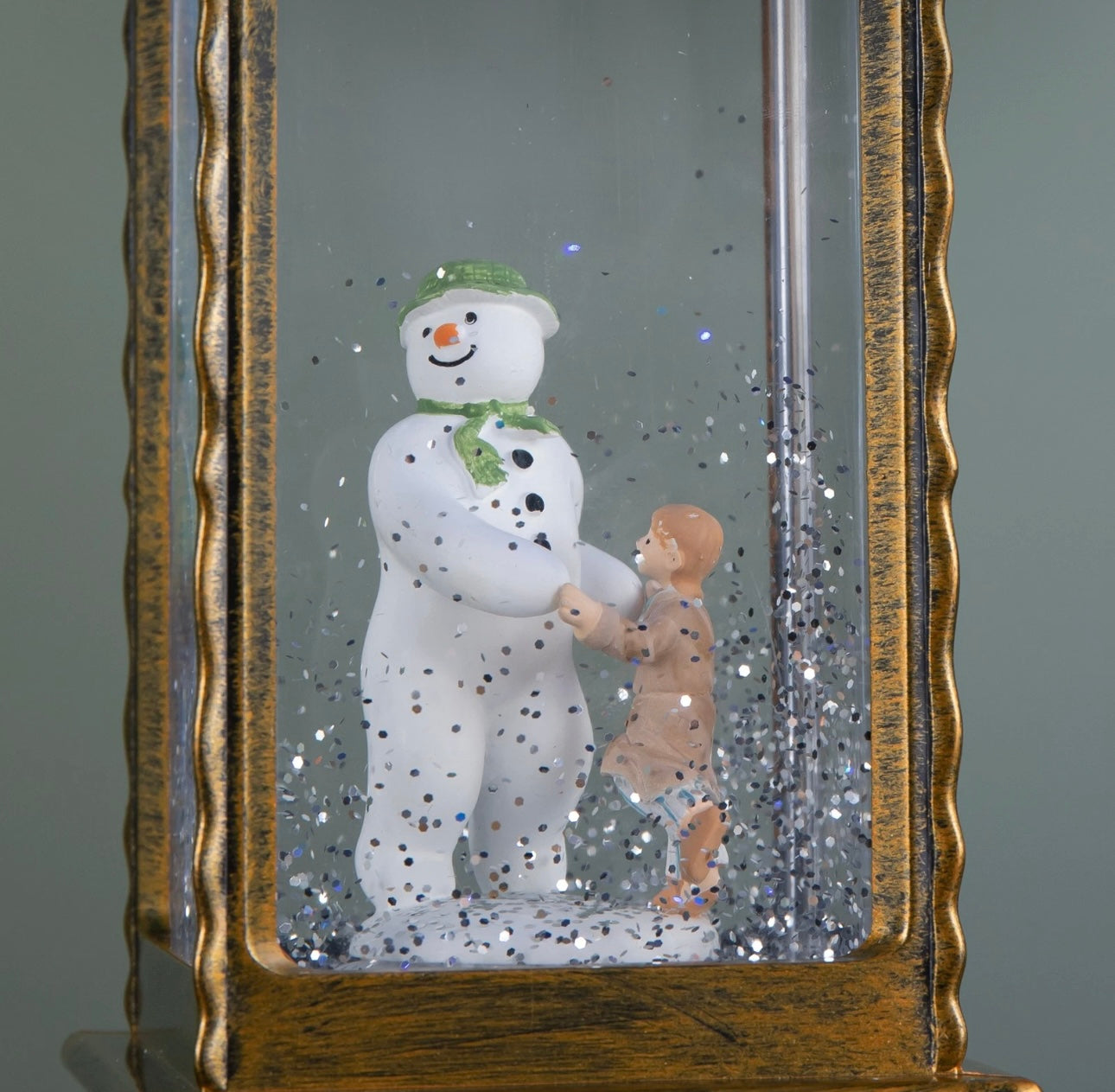 A Snowman & Boy Water Spinner