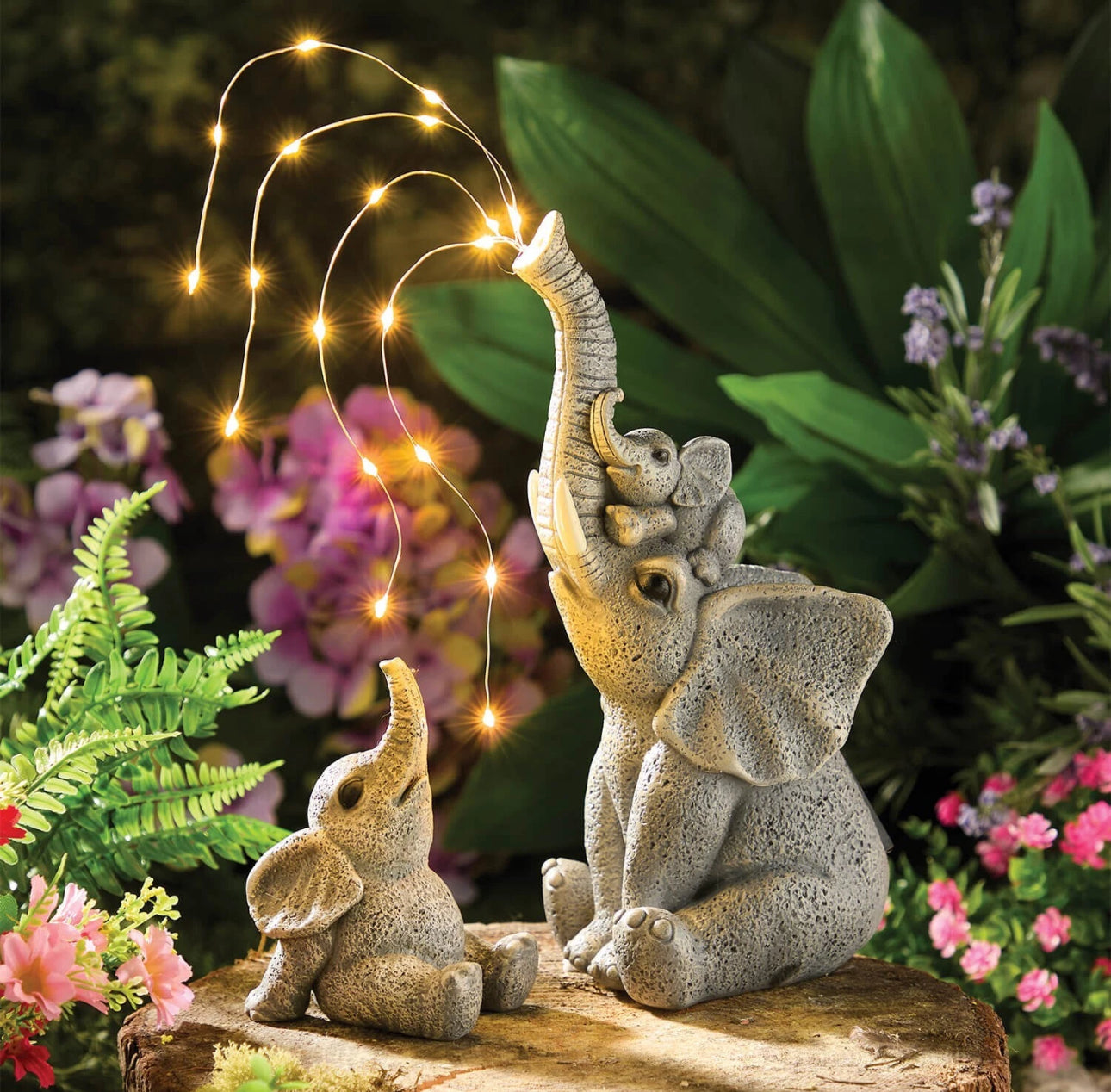 Solar Elephant Family Trickling Water