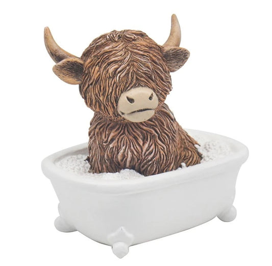 Highland Coo Taking A Bath