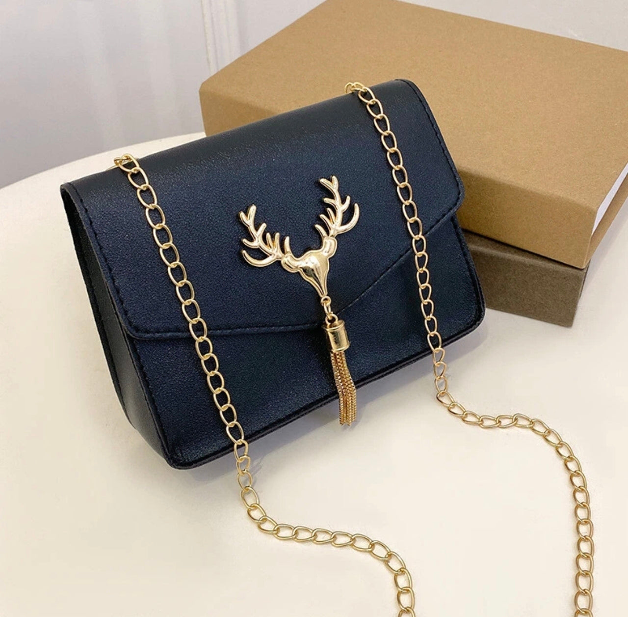 Small Bag With Chain Strap And Stag Embellishment