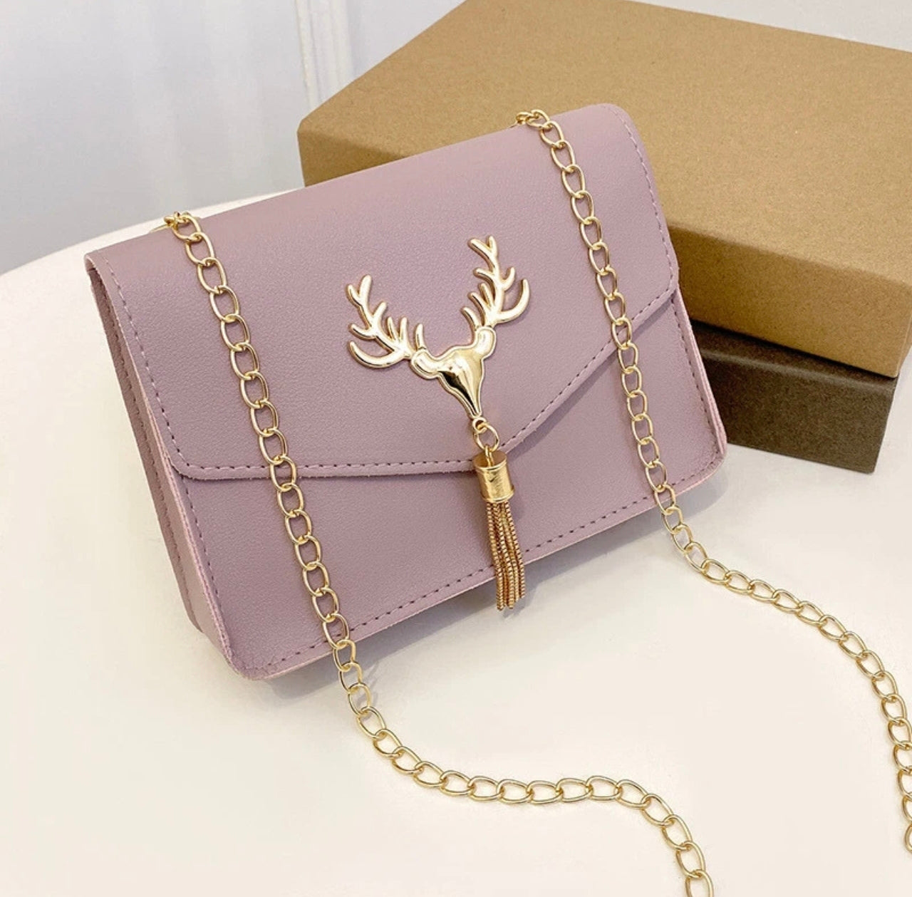 Small Bag With Chain Strap And Stag Embellishment