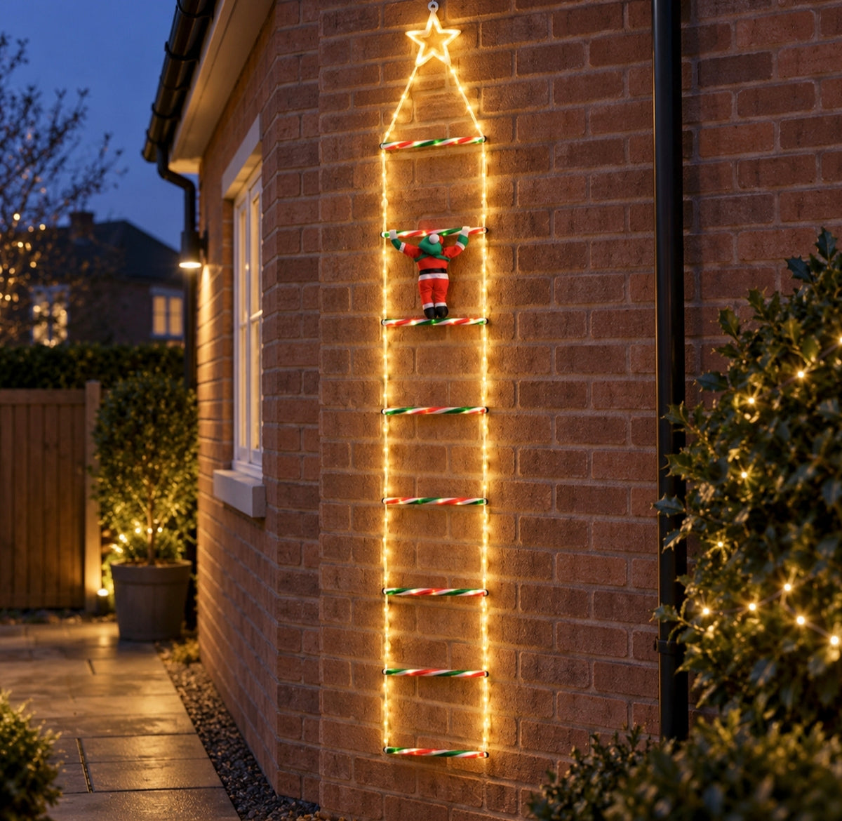 Santa Climbing A Light Up Ladder