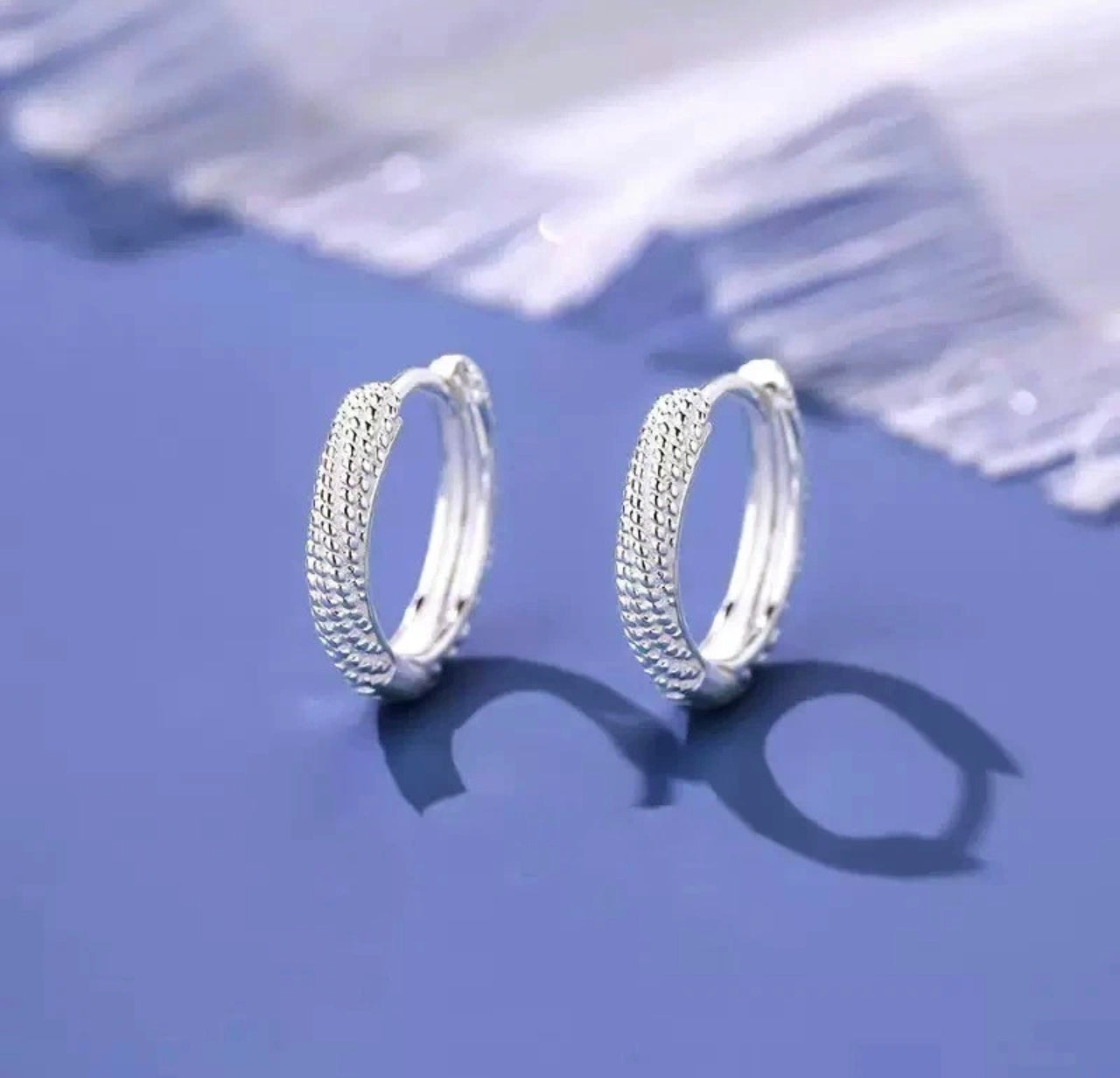 Sparkly Twist Huggie Hoop Earrings